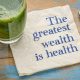 The greatest wealth is health napkin with green smoothie