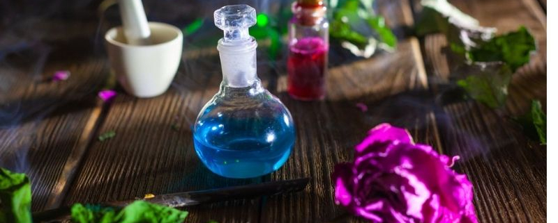 potions and herbs on a table